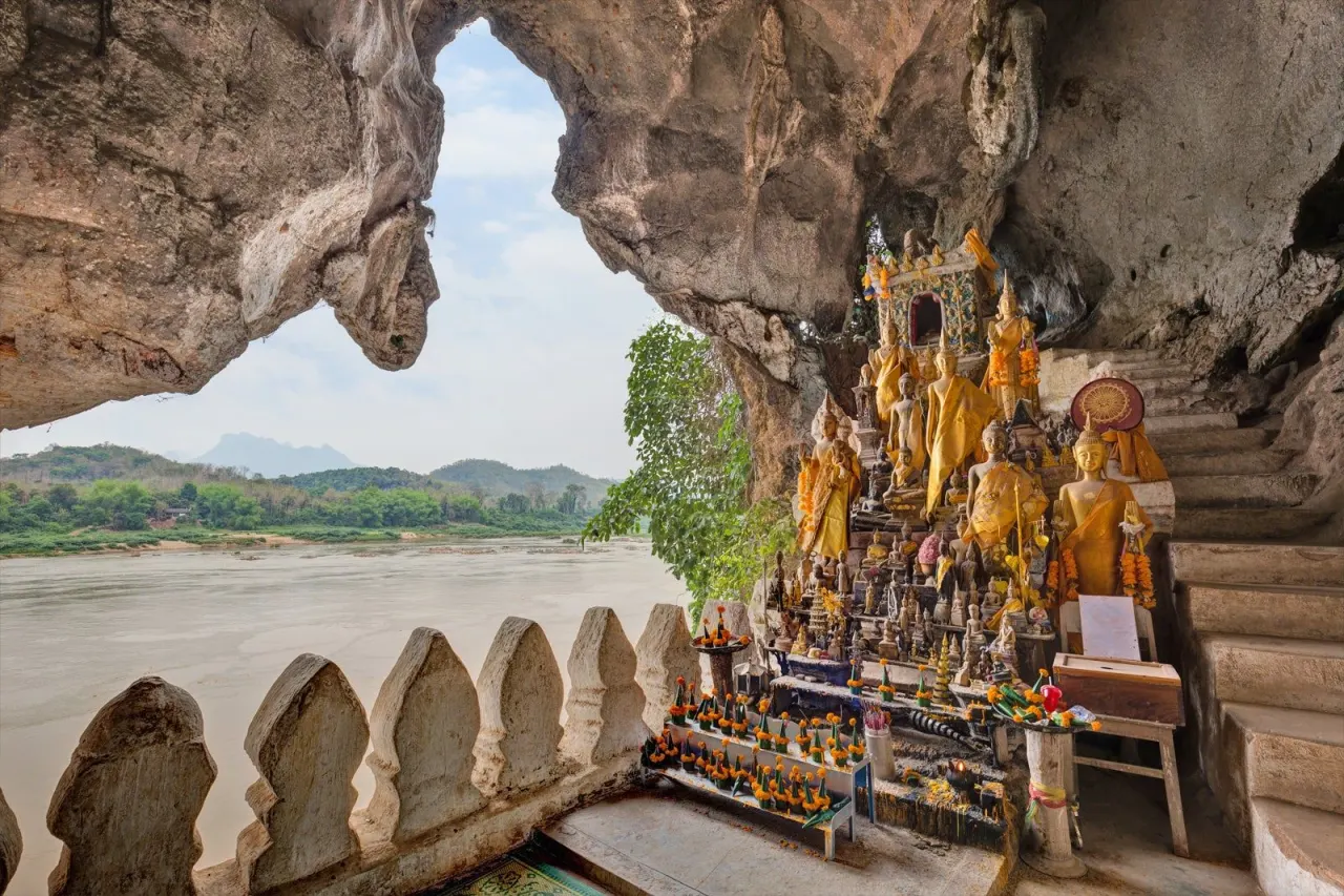Buddha statues in the Pak Ou Caves, looking out over the Mekong