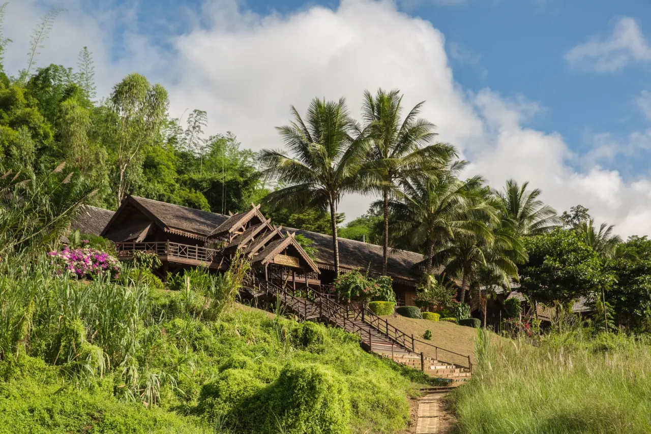 Luang Say Lodge in Pakbeng, wooden bungalows on a green hillside above the Mekong