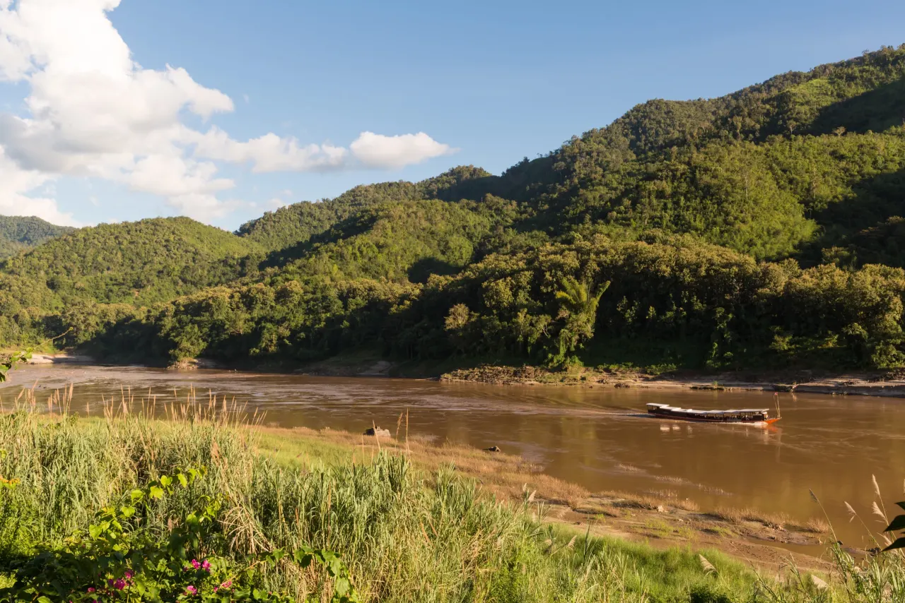 A boat on the Mekong seen from Luang Say Lodge